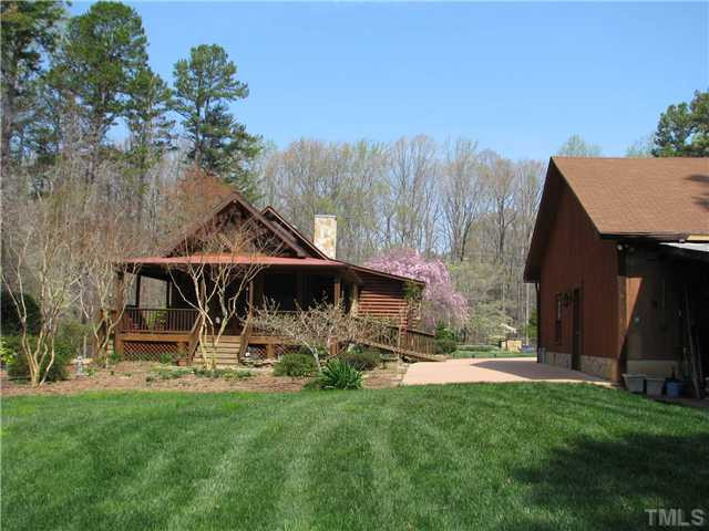 1305 Bill Poole Road Rougemont, NC 27572 - Photo 20 of 24 Side view of home with screened porch! Manicured lawn! Land/Lot