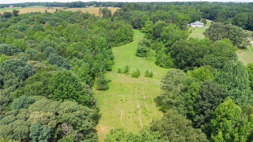 482 Hooper Road Commerce, GA 30530 - Photo 8 of 12 an aerial view of residential house with green space