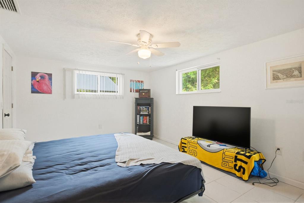 4276 Rudder Way New Port Richey, FL 34652 - Photo 17 of 29 a living room with furniture and a flat screen tv