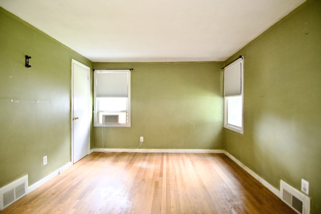 138 West Allen Ridge Road Springfield, MA 01118 - Photo 29 of 42 a view of room with window and wooden floor