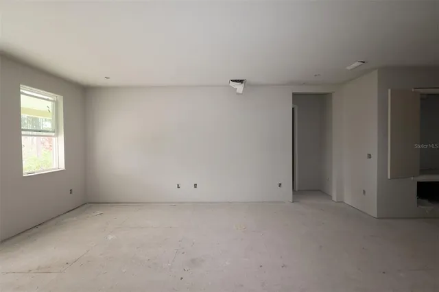 an empty room with a window