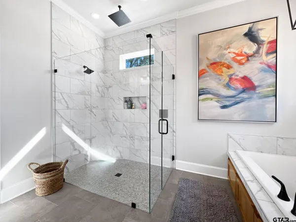 a bathroom with a shower and a toilet