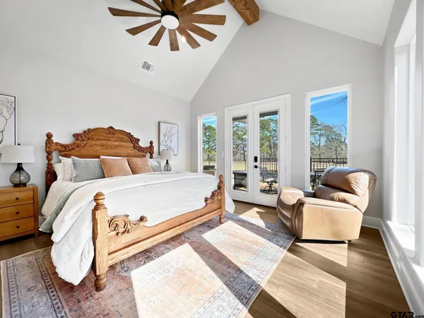 a bed room with a bed and a couch