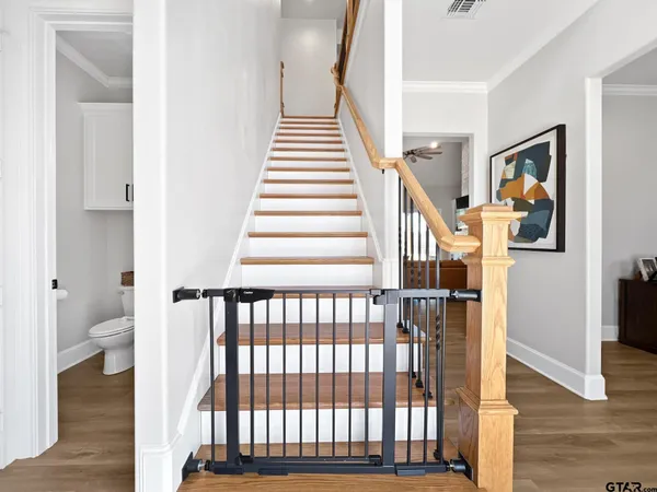 a view of entryway with wooden floor