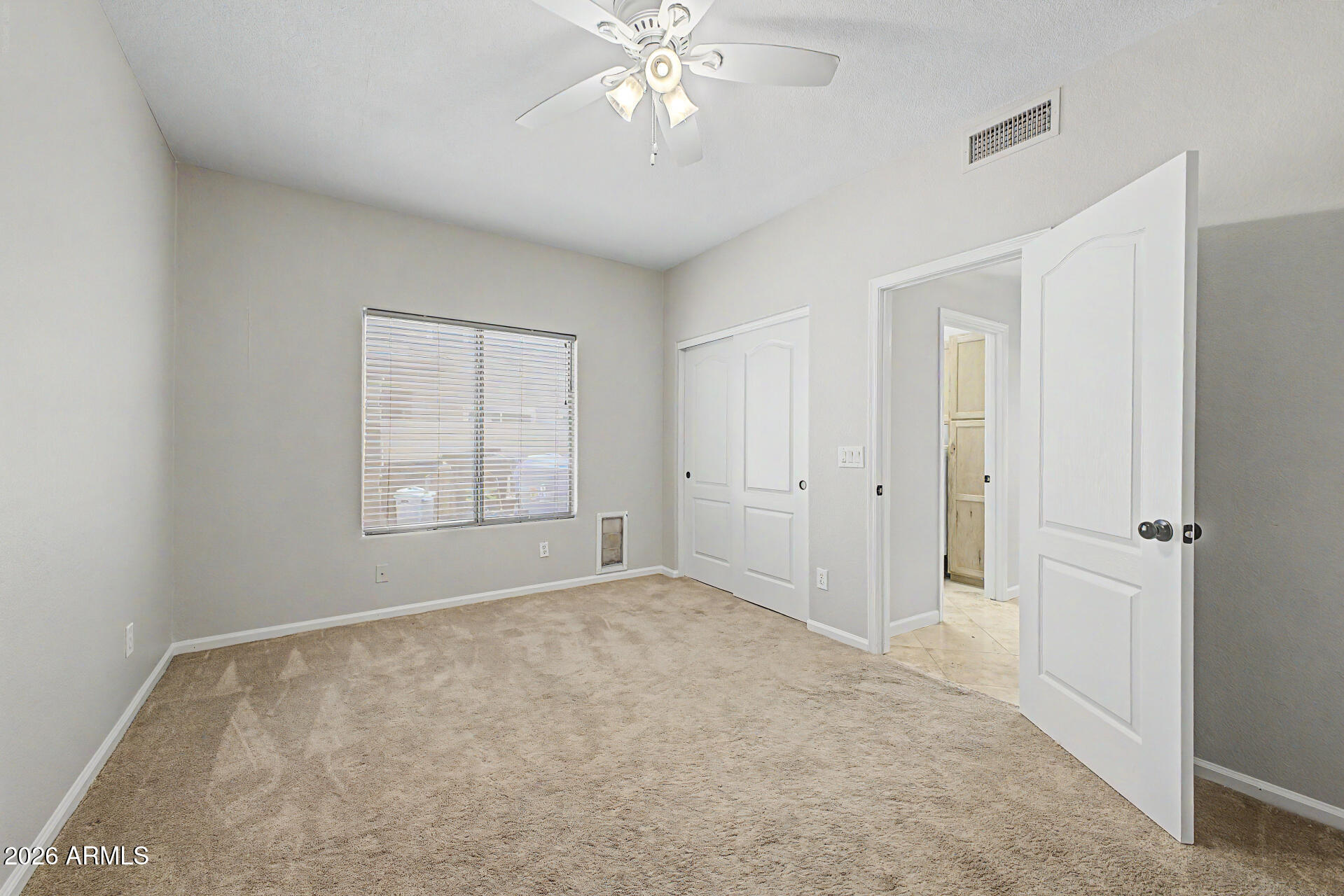 1306 East Erie Street Gilbert, AZ 85295 - Photo 40 of 62 a view of an empty room with a window