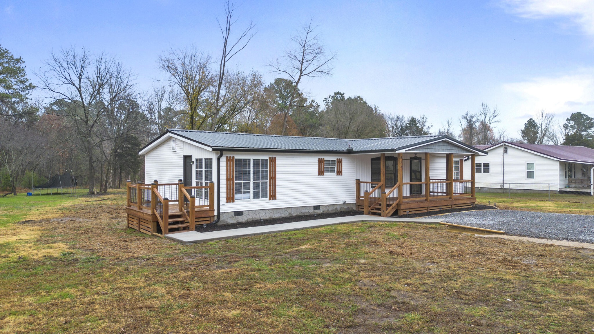 635 Durkee Road Southeast Cleveland, TN 37323 - Photo 3 of 45 a front view of house with yard outdoor seating and barbeque oven
