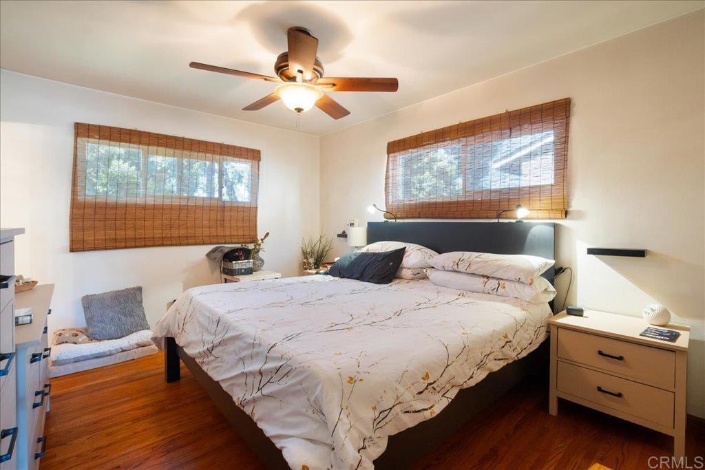 646 Downer Avenue El Cajon, CA 92020 - Photo 12 of 18 a bedroom with a bed and wooden floor