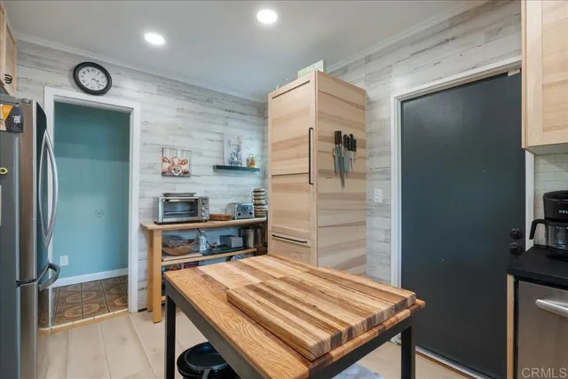 a room with a table and chairs