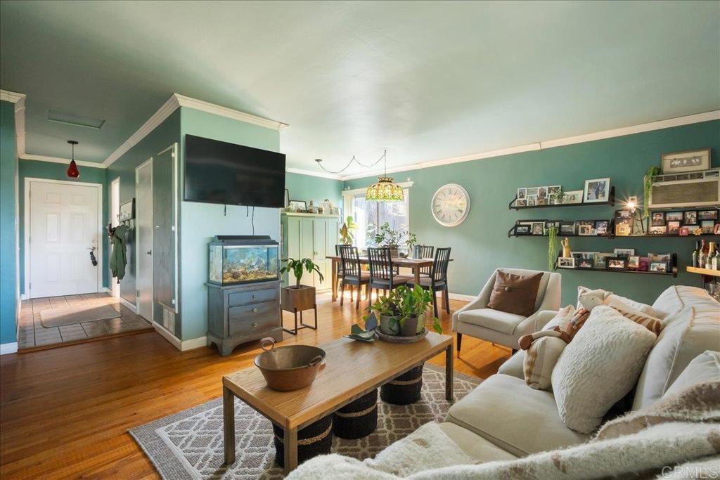 646 Downer Avenue El Cajon, CA 92020 - Photo 8 of 18 a living room with furniture and a wooden floor