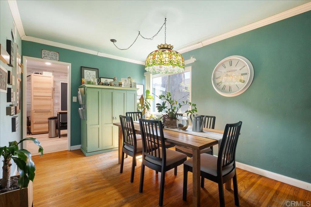 646 Downer Avenue El Cajon, CA 92020 - Photo 9 of 18 a view of a dining room with furniture window and wooden floor