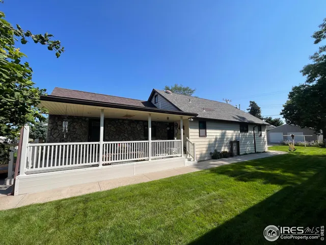 a house view with a garden space