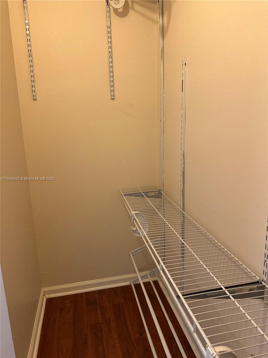 5840 West Sample Road, Unit 306 Coral Springs, FL 33067 - Photo 21 of 22 a view of a room with staircase