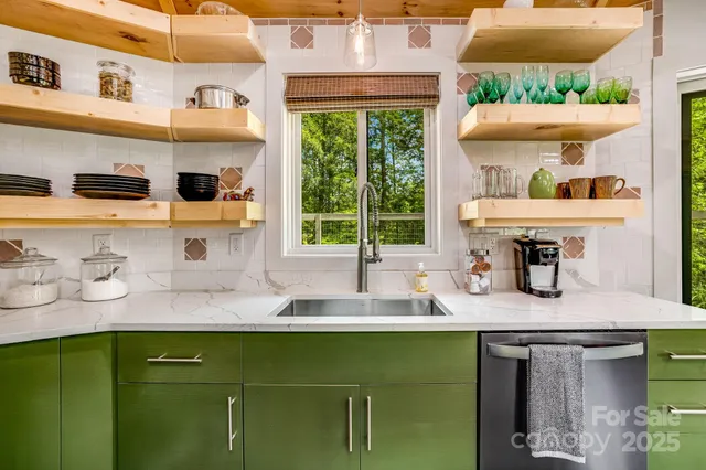 a kitchen with sink and window