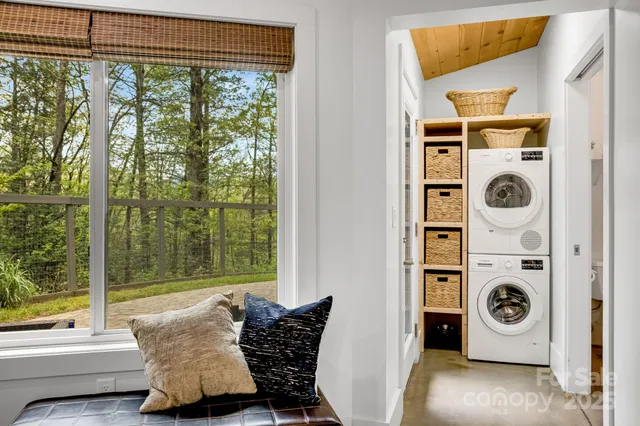 a bedroom with a bed and a chair