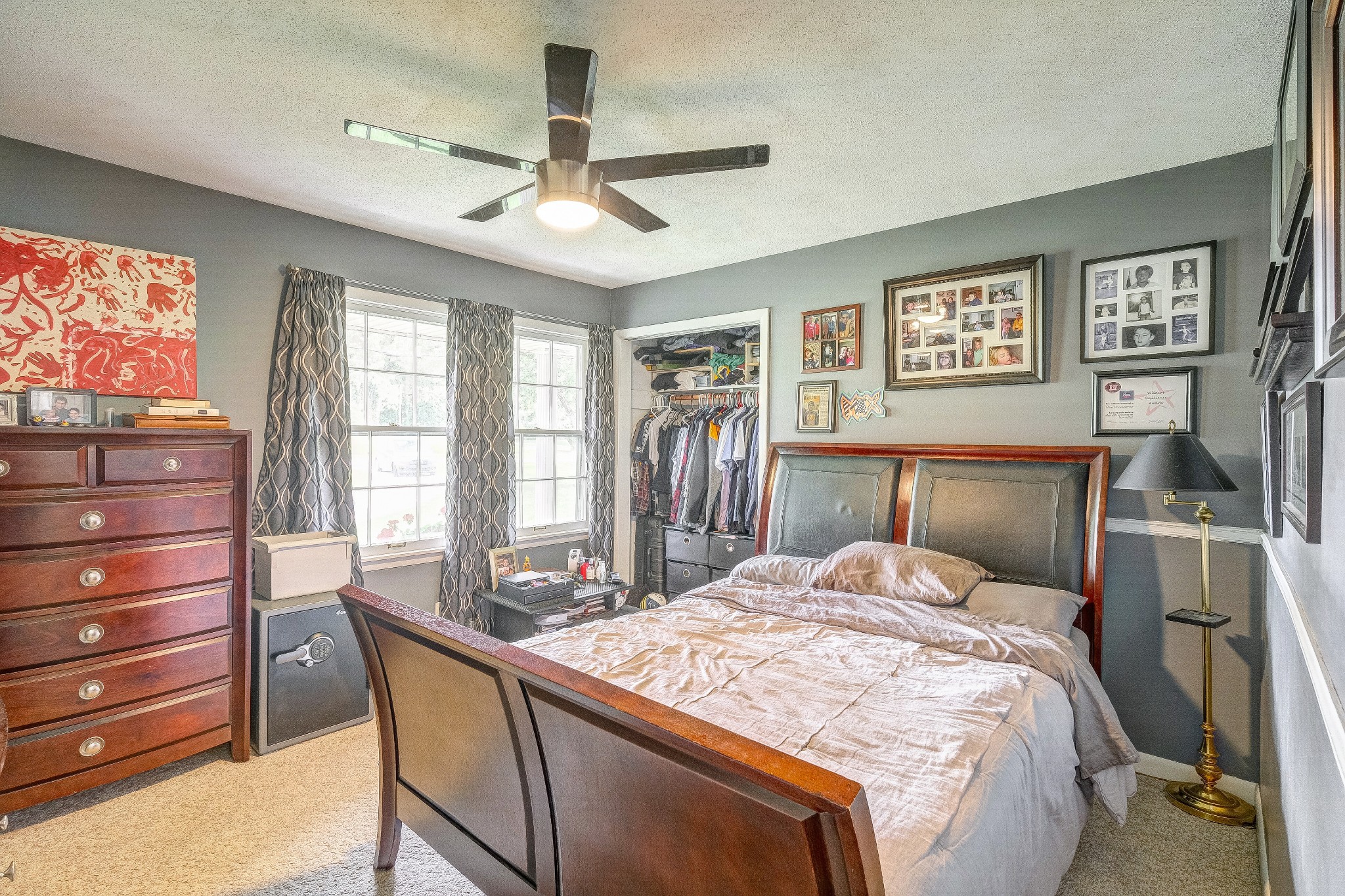 908 Fall River Road Lawrenceburg, TN 38464 - Photo 11 of 22 a bedroom with a large bed and a flat tv screen