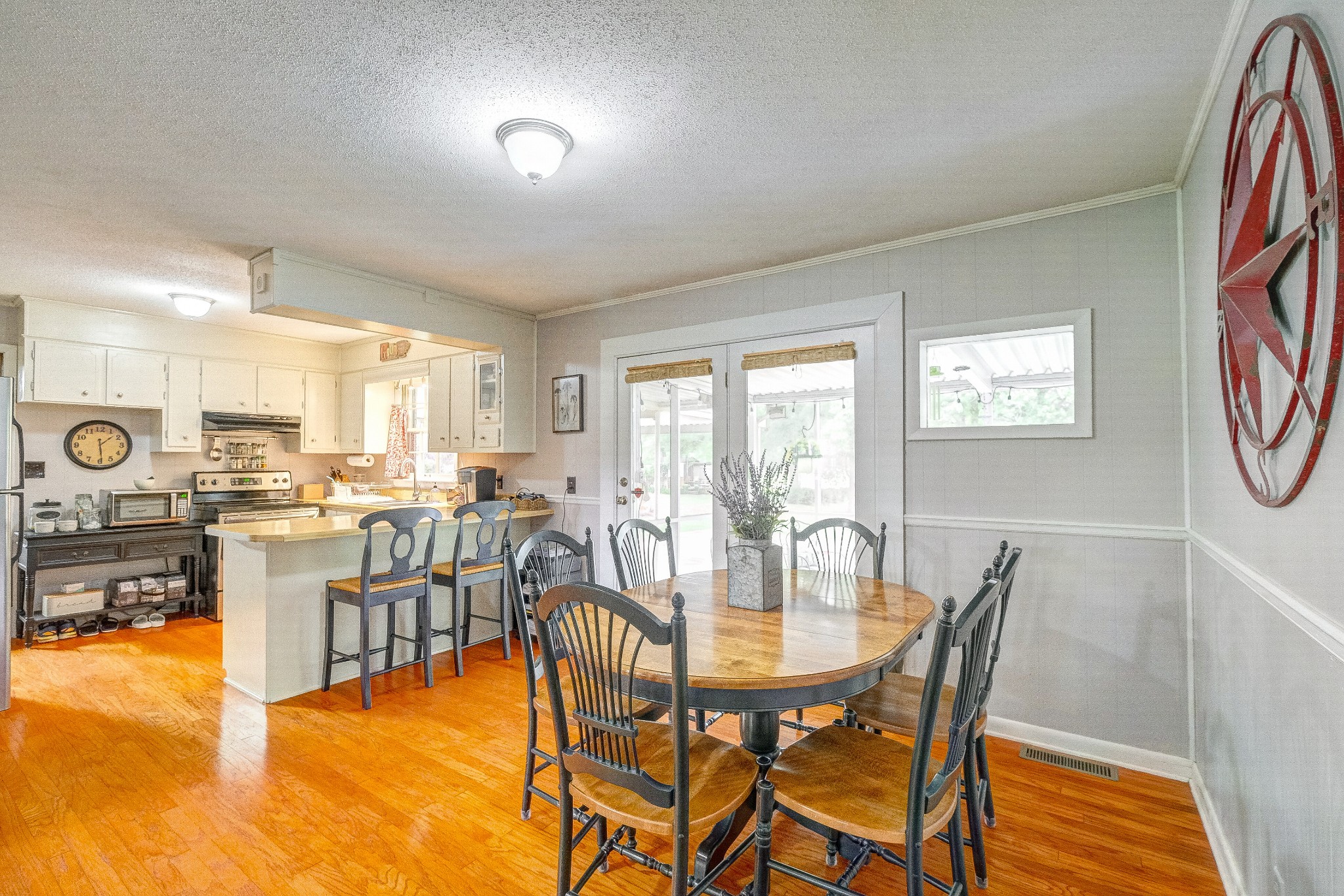 908 Fall River Road Lawrenceburg, TN 38464 - Photo 8 of 22 a view of a dining room with furniture and a table