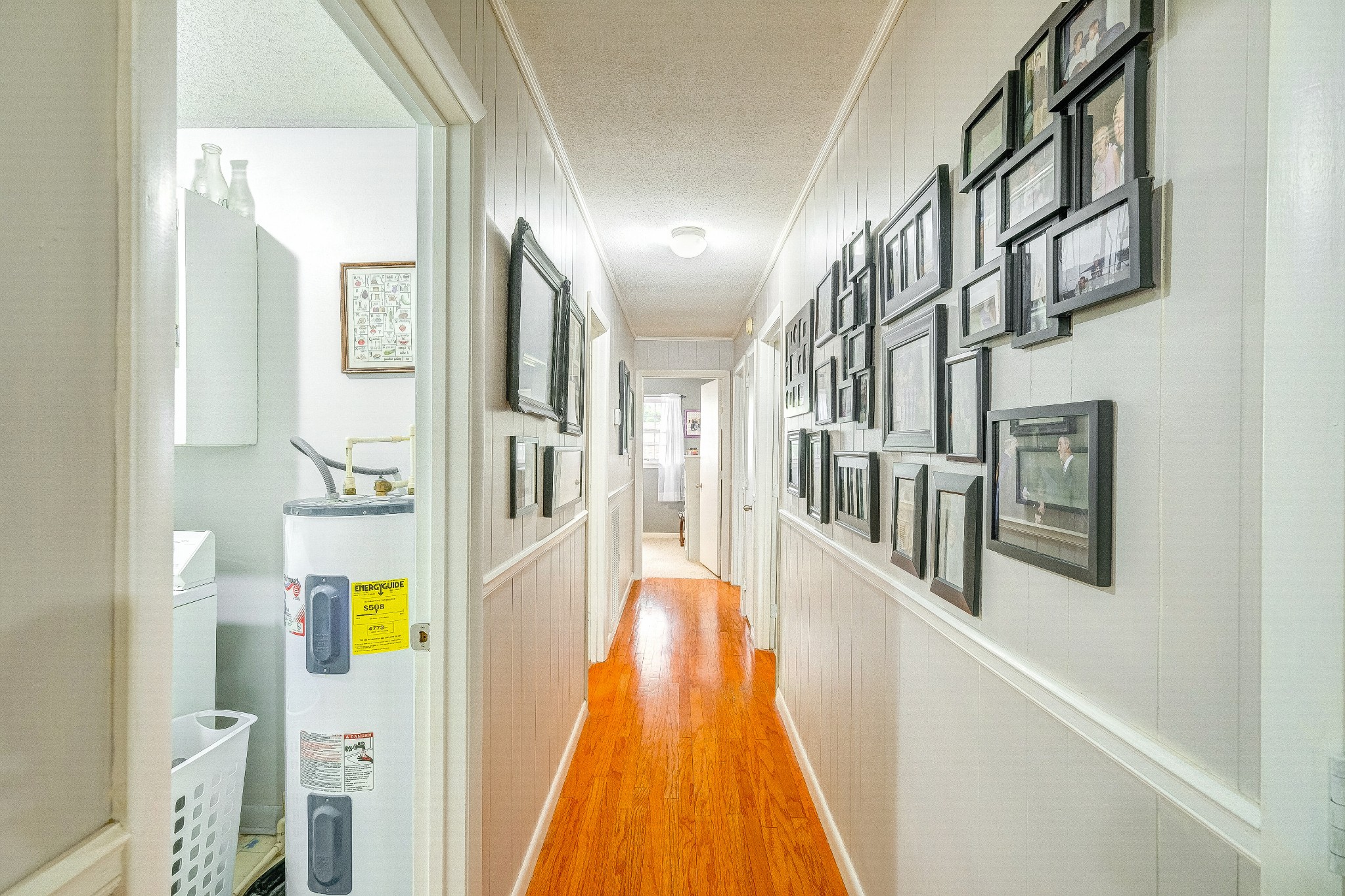 908 Fall River Road Lawrenceburg, TN 38464 - Photo 9 of 22 a view of an entryway with wooden floor and a living room