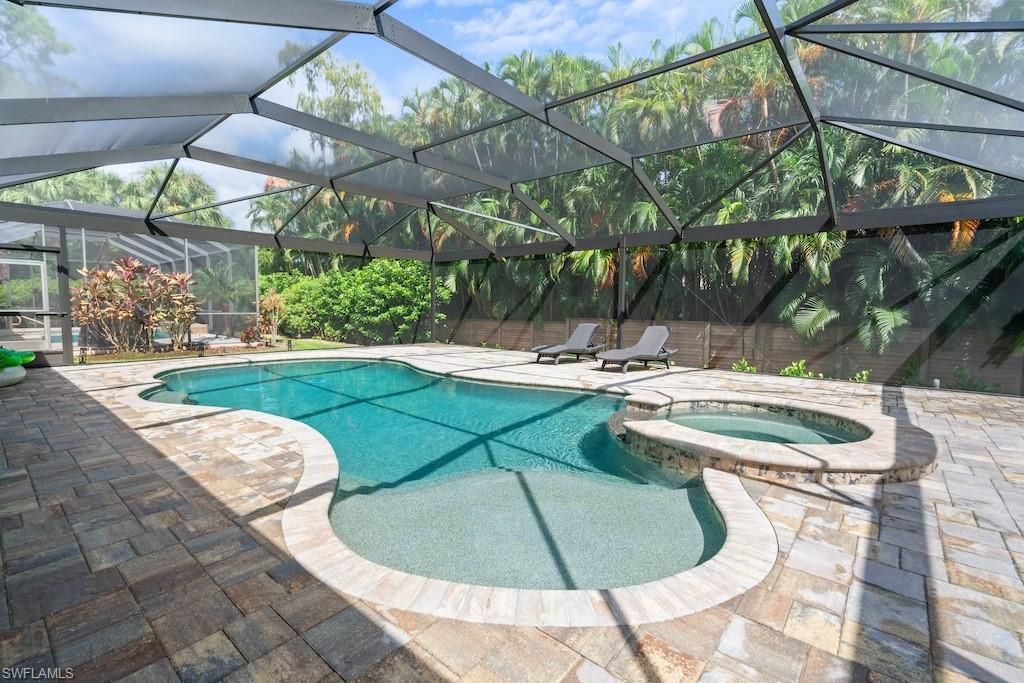 15917 Delasol Lane Naples, FL 34110 - Photo 25 of 32 a view of outdoor space yard swimming pool and outdoor