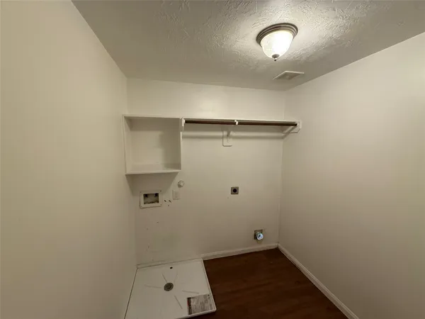 an empty room with a empty space and a window