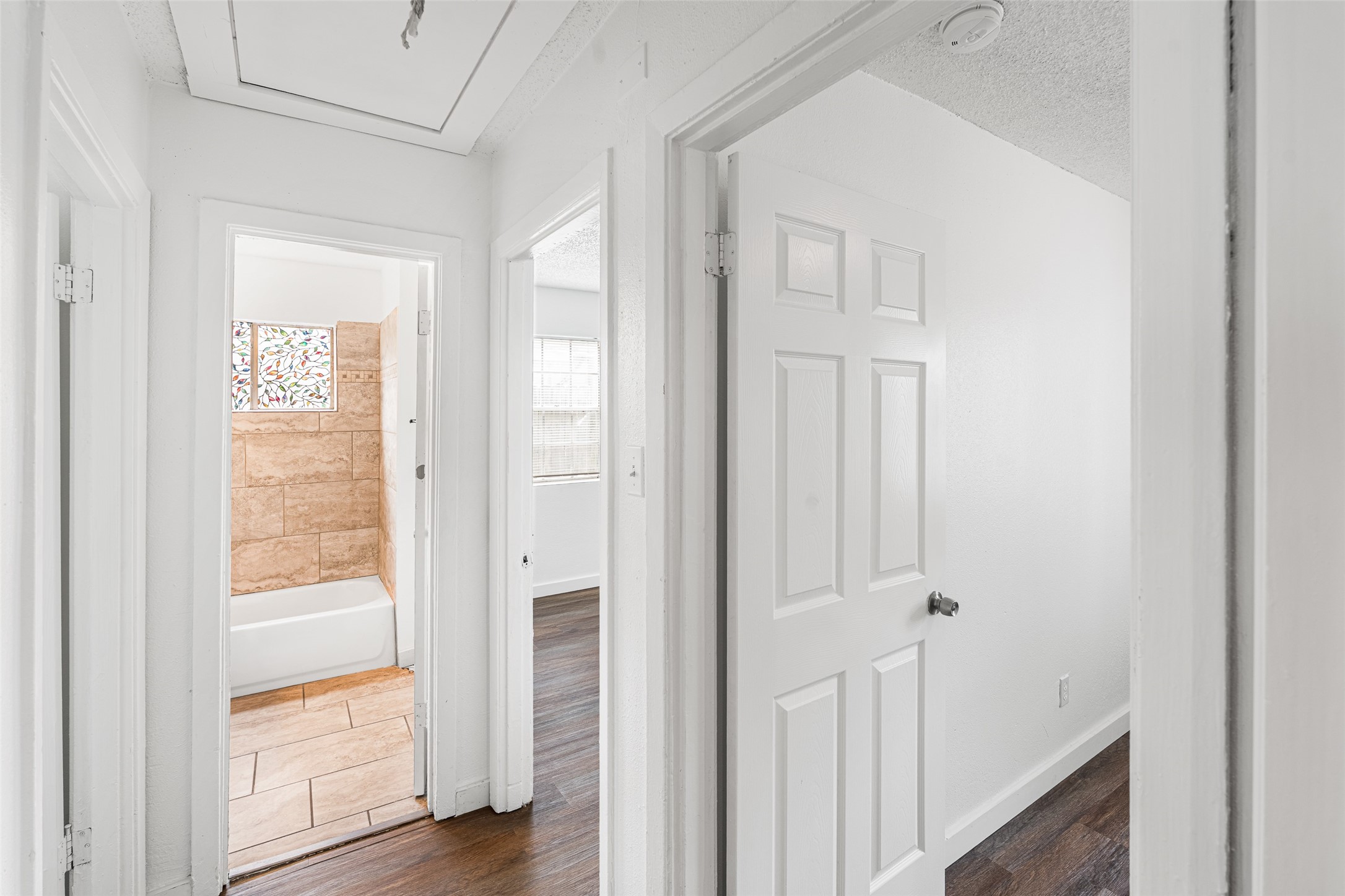 9005 Gabriel Street Houston, TX 77063 - Photo 15 of 21 a view of an entryway with wooden floor