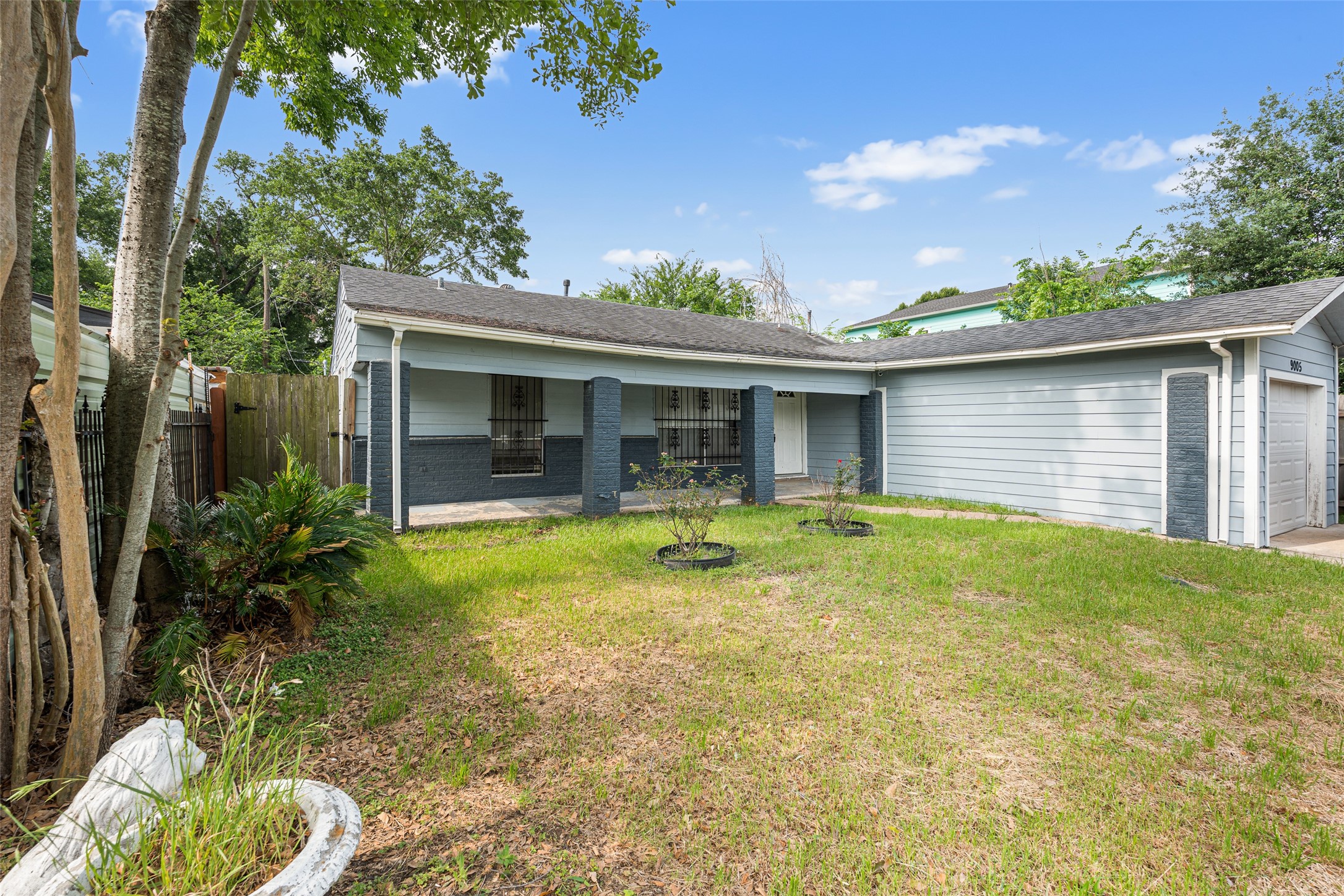 9005 Gabriel Street Houston, TX 77063 - Photo 21 of 21 a view of an house with backyard space and balcony