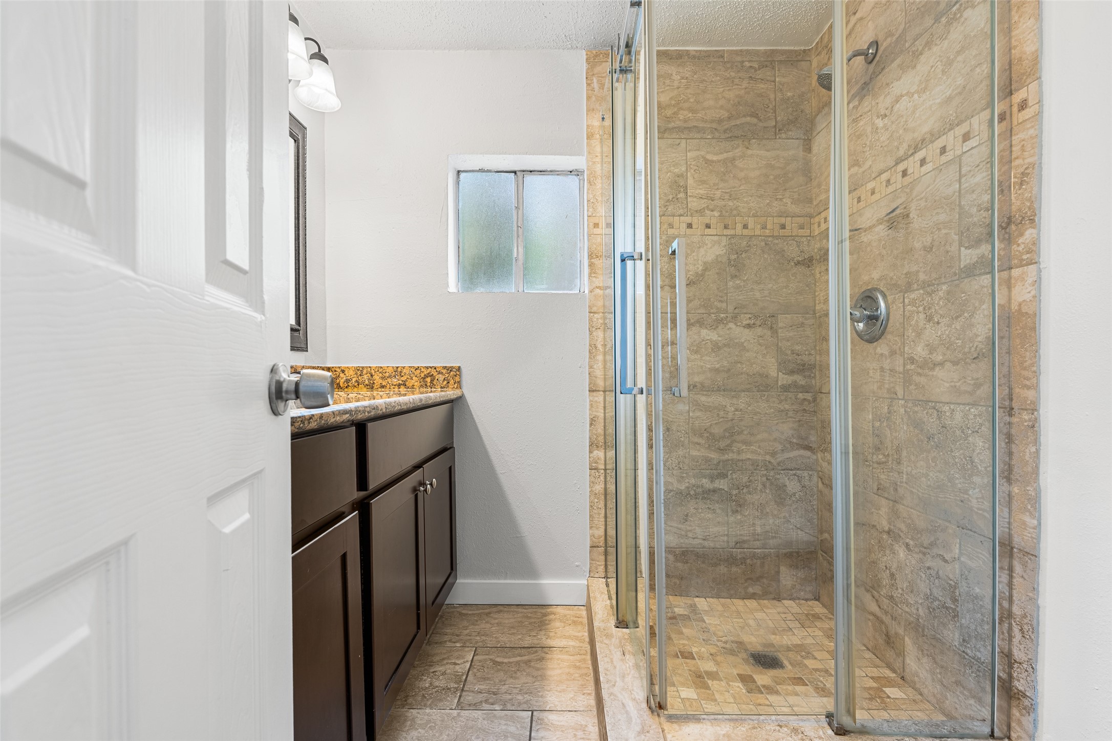 9005 Gabriel Street Houston, TX 77063 - Photo 8 of 21 a utility room with shower