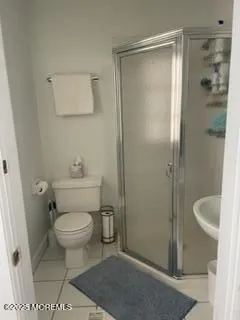 a view of a livingroom with furniture and a window