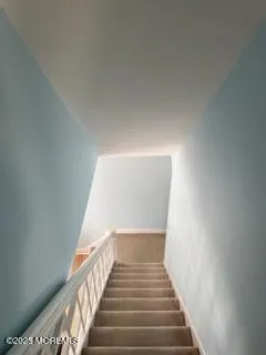 a view of a livingroom with furniture and window