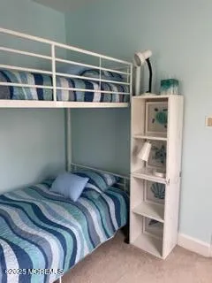 a view of a two chairs in the porch