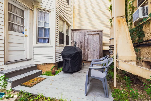 a bathroom with a sink toilet and mirror