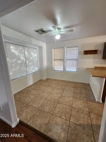 a view of an empty room and window