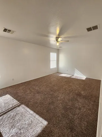 a bathroom with a shower and a toilet