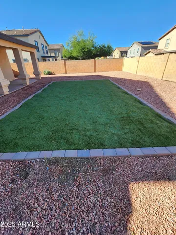 a backyard of a house with a yard