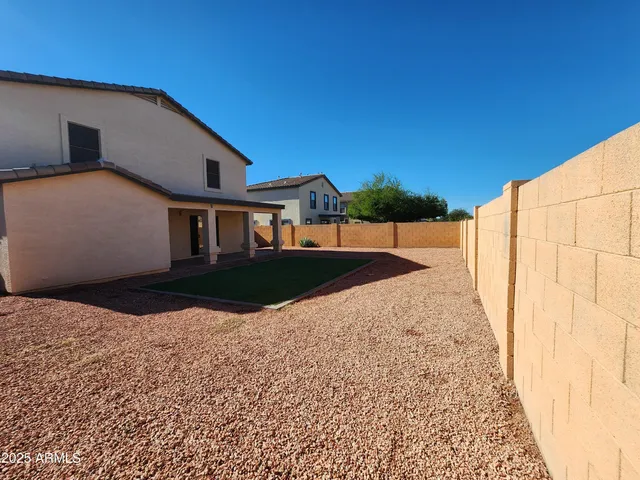 a view of a garden with an outdoor space