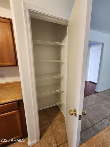 a view of a kitchen with a sink