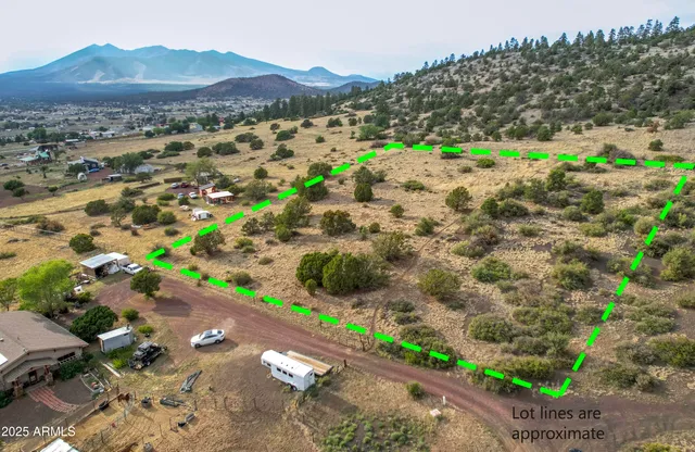 a view of a street with a mountain