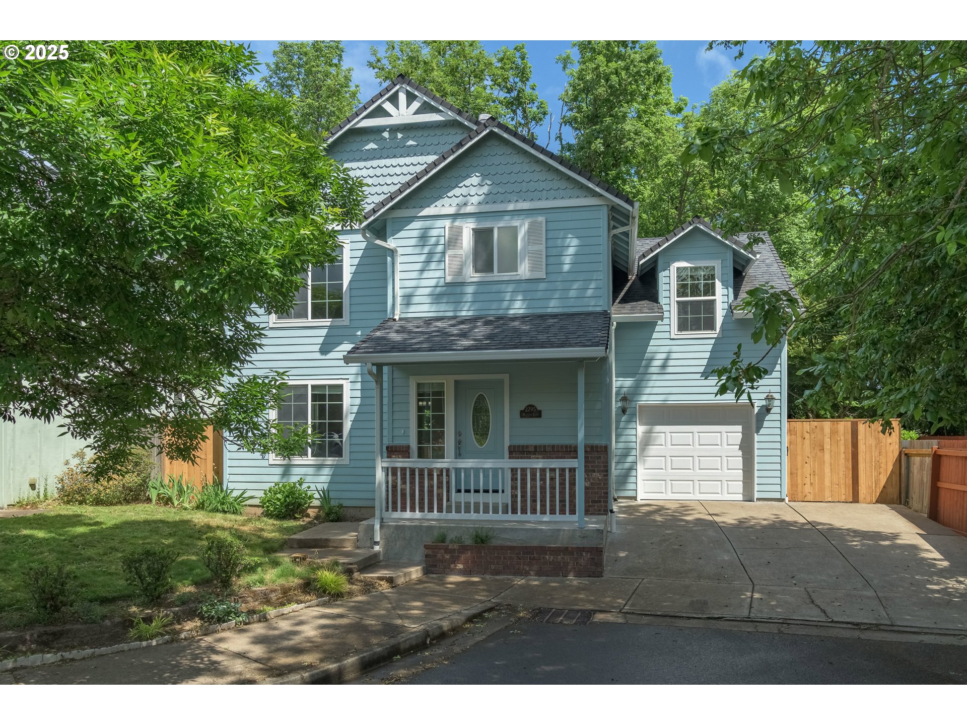 2795 Mallory Lane Eugene, OR 97401 - Photo 1 of 44 a view of front of a house with a yard