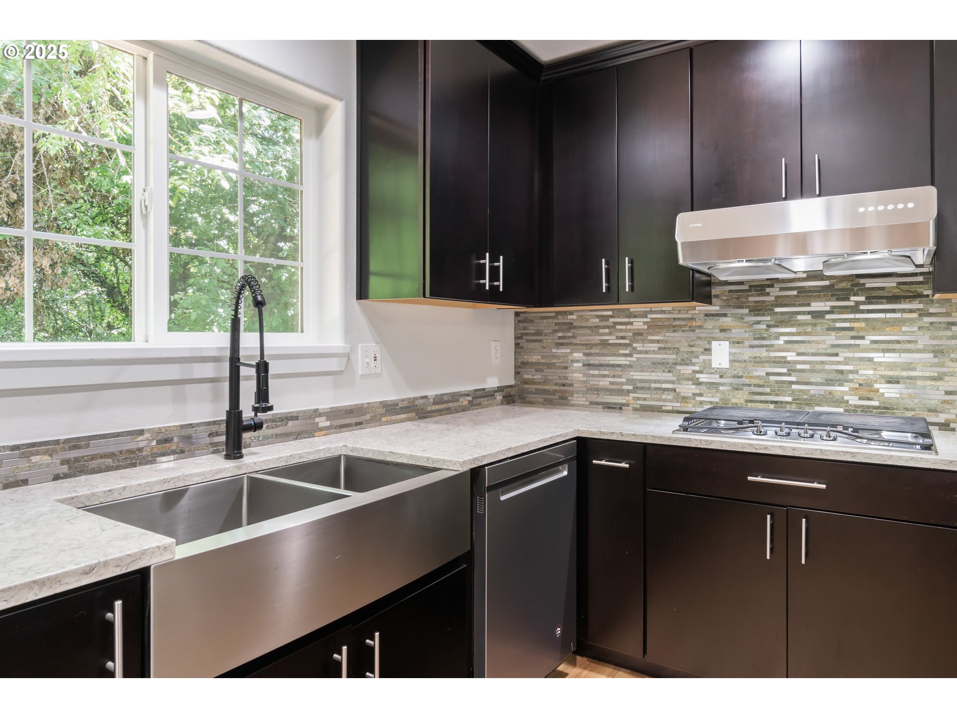2795 Mallory Lane Eugene, OR 97401 - Photo 11 of 44 a kitchen with a sink and large window