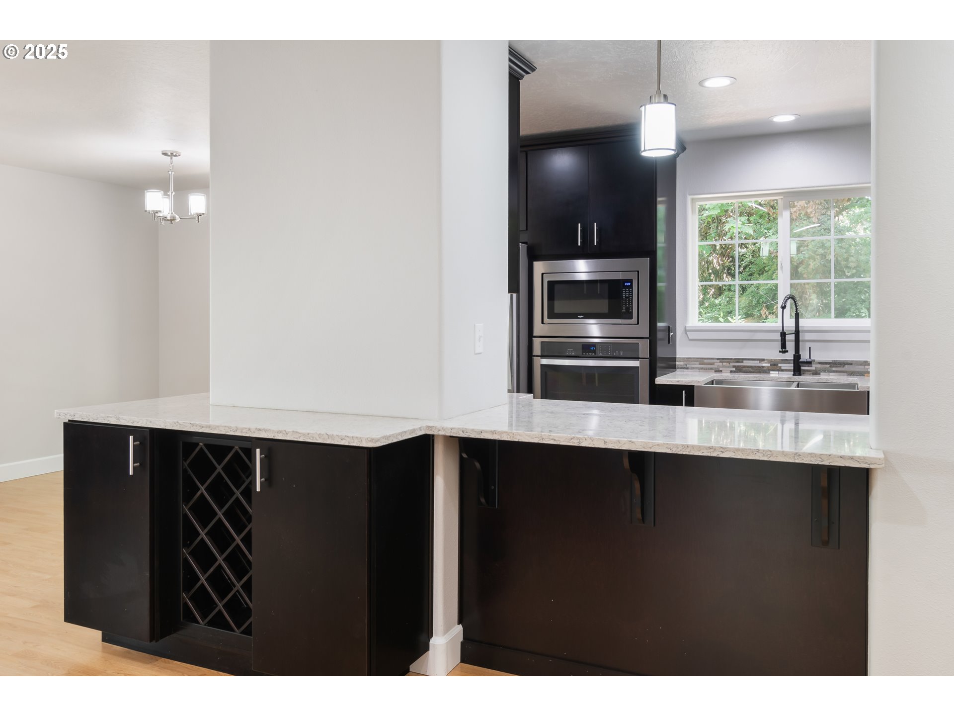 2795 Mallory Lane Eugene, OR 97401 - Photo 14 of 44 a kitchen with a sink and cabinets