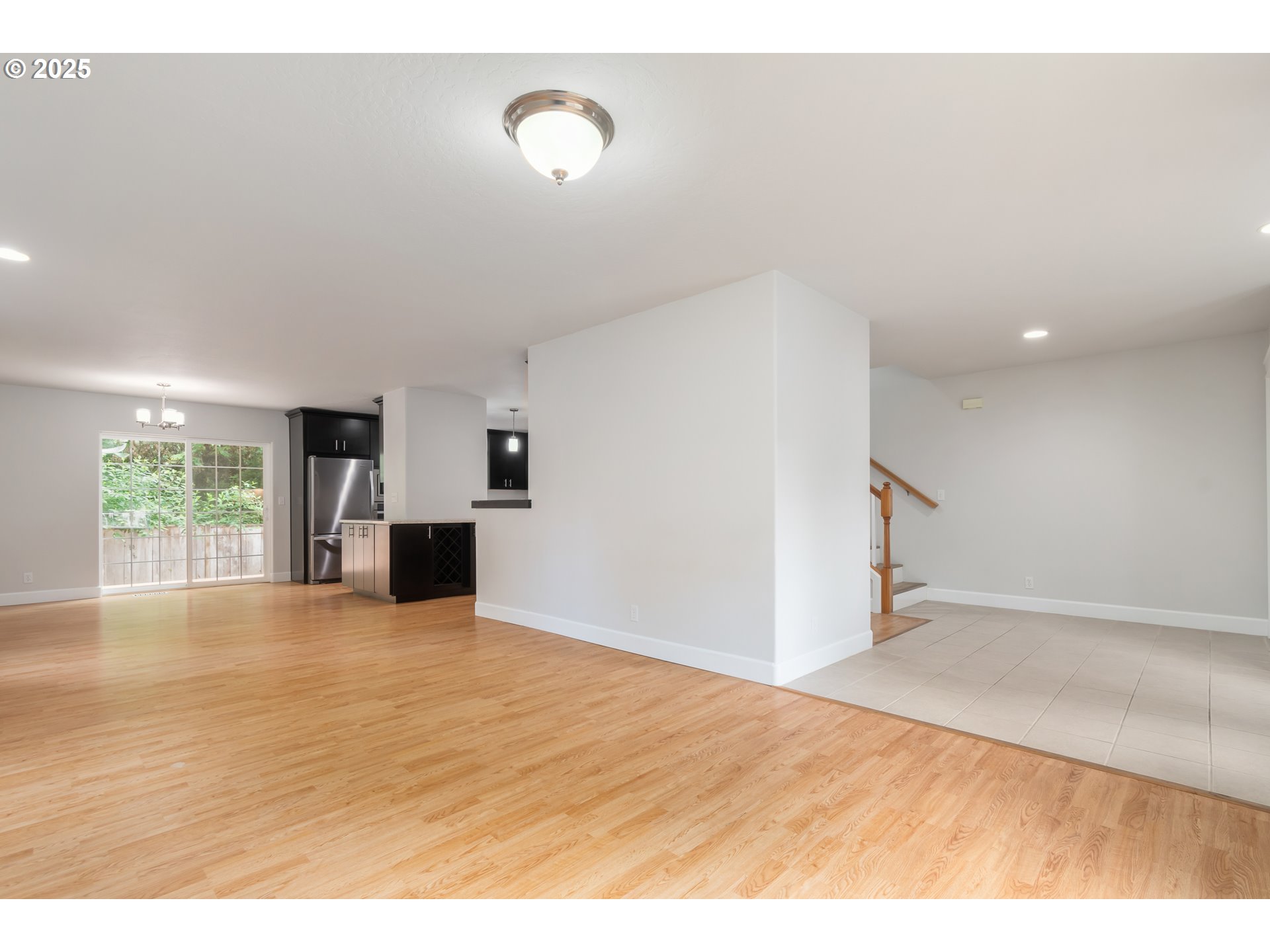 2795 Mallory Lane Eugene, OR 97401 - Photo 6 of 44 a view of empty room with wooden floor