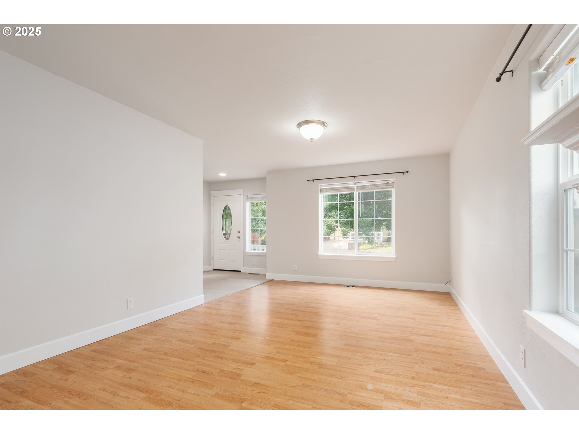 2795 Mallory Lane Eugene, OR 97401 - Photo 7 of 44 a view of an empty room with a window