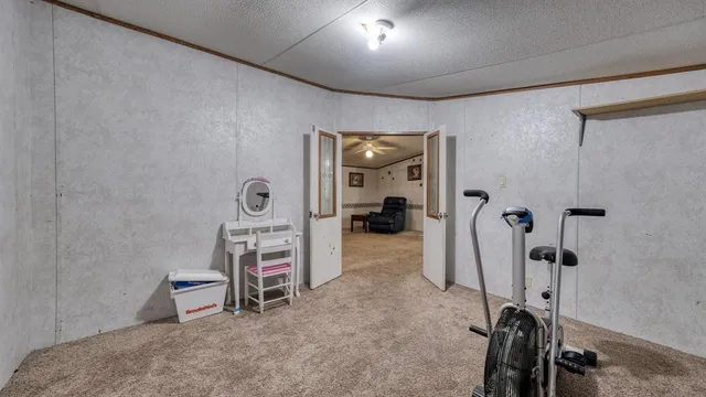 a view of a room with gym equipment