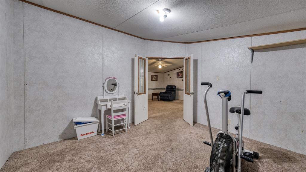 1700 Bennett Road Millsap, TX 76066 - Photo 14 of 40 a view of a room with gym equipment