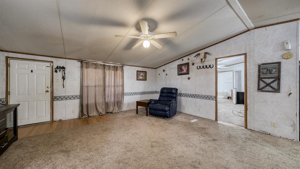 1700 Bennett Road Millsap, TX 76066 - Photo 15 of 40 a view of livingroom with furniture and a ceiling fan