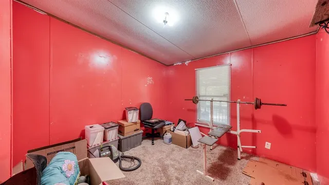a bathroom with a toilet sink and shower