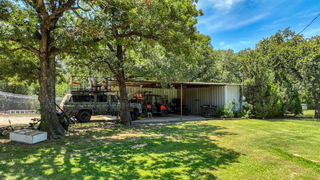 1700 Bennett Road Millsap, TX 76066 - Photo 24 of 40 a view of a children toys in front of house