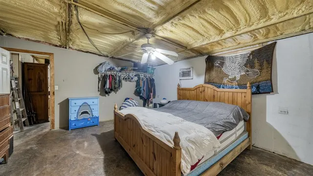 a bathroom with a sink toilet and mirror