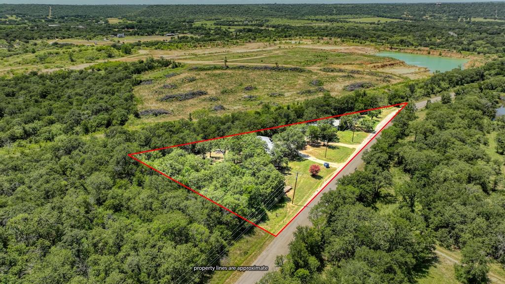 1700 Bennett Road Millsap, TX 76066 - Photo 36 of 40 a view of a lake with a city