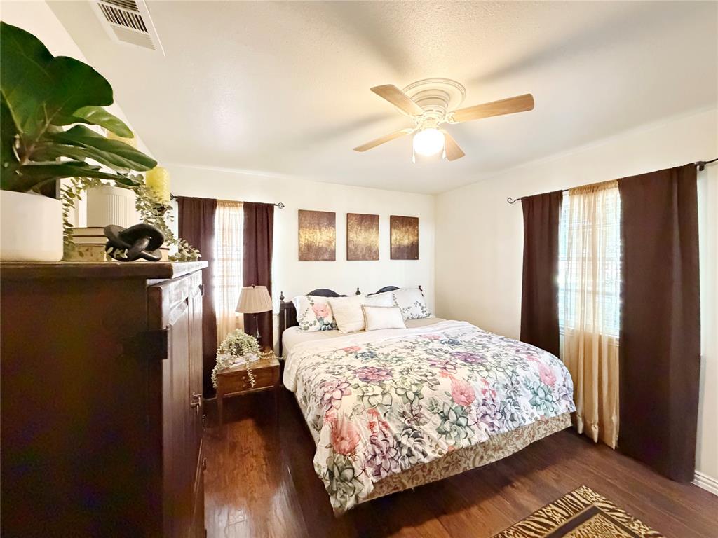 2243 Inca Drive Dallas, TX 75216 - Photo 13 of 24 Primary bedroom is located at the front of the home.