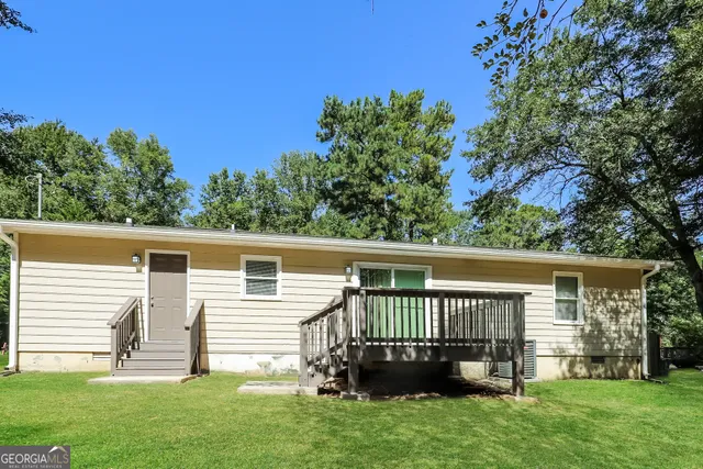 front view of a house with a deck